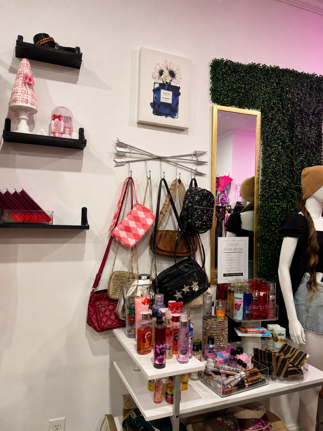Accessory wall with handbags and small goods at The Style Exchange